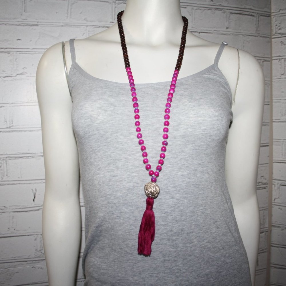 Beautiful wooden and pink beaded necklace with tassel 34"